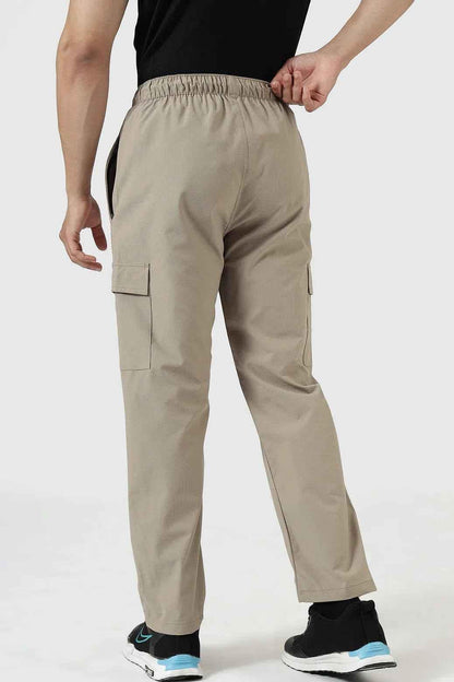 Beige Fuaark Nz Vitality Straight Track Pants displayed with a relaxed fit and elastic waistband.
