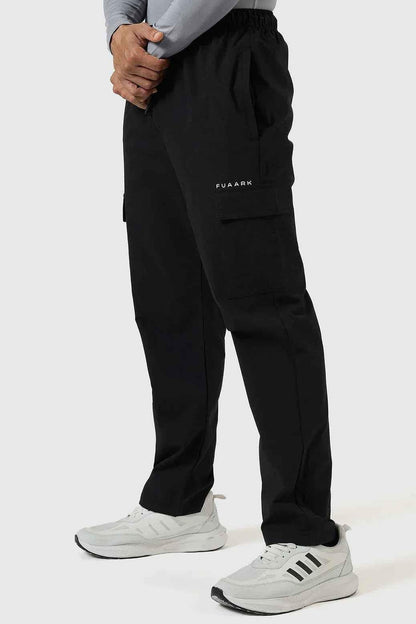 Black Fuaark Nz Vitality Straight Track Pants laid flat, showing the sleek design and comfortable fit for active wear.