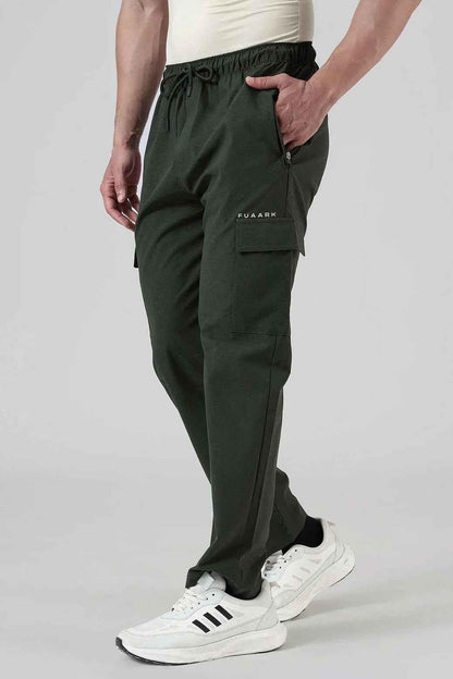 Olive green Fuaark NZ Vitality Straight Pants track pants with a relaxed fit, shown on a model.