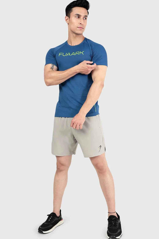 Fuaark Nz Aura Textured T-shirt in teal, showing close-up of fabric texture and fit on a model.