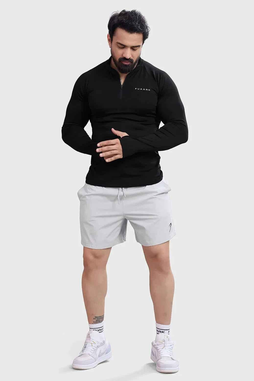 Fuaark Nz black Axis Pullover T-shirt laid flat showing the front design and fabric texture.