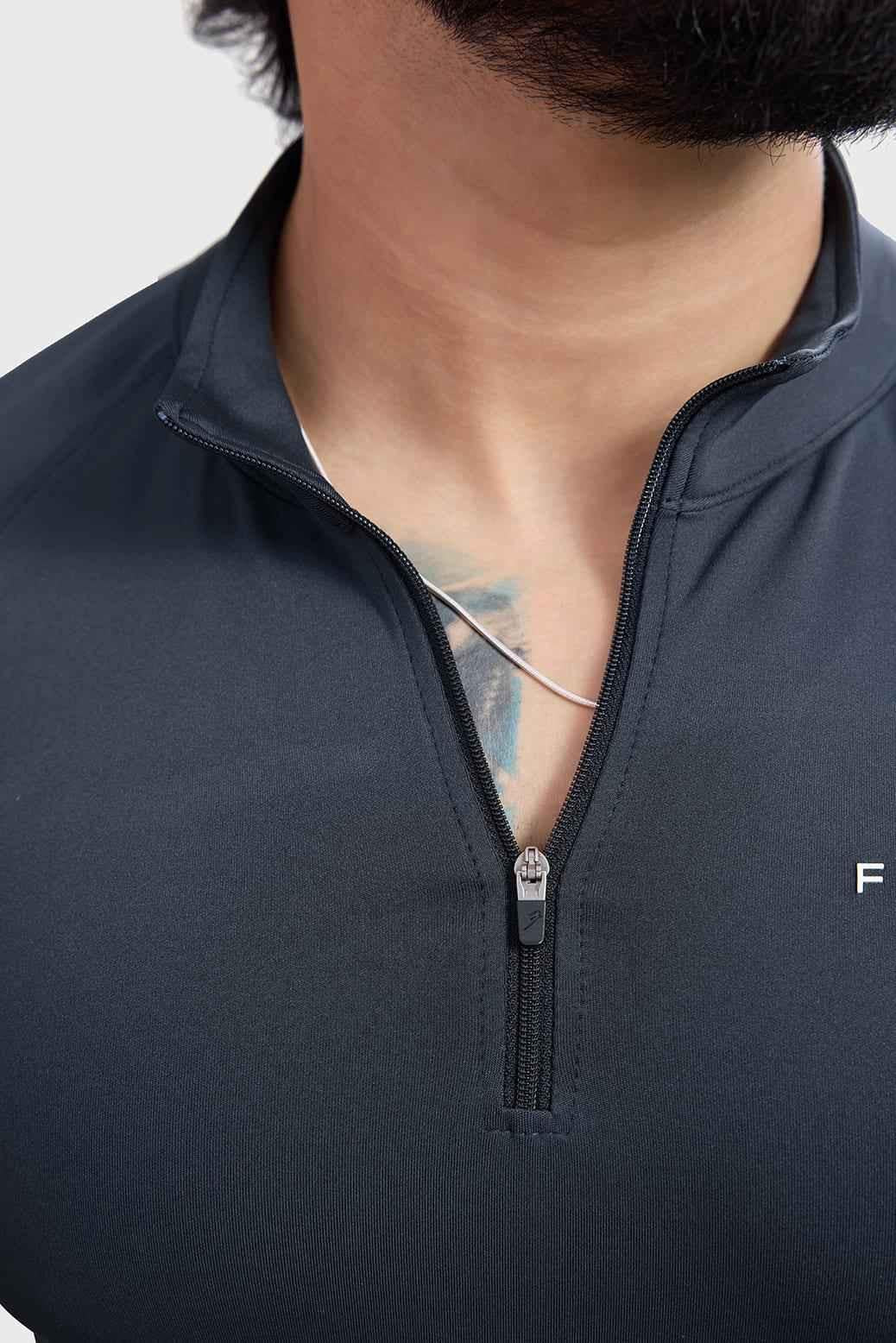 Dark grey Fuaark NZ Axis Pullover T-shirt displayed on a hanger, showcasing a casual and comfortable fit.