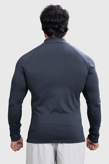 Dark grey Fuaark NZ Axis Pullover T-shirt displayed on a hanger, showcasing its casual fit and soft fabric.