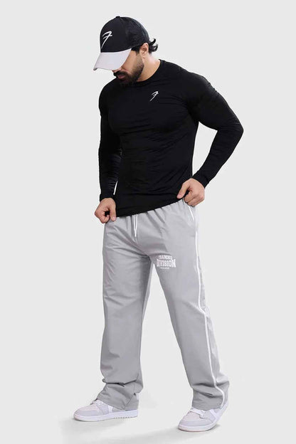 Black Bare Nylon Fullsleeves T-shirt by Fuaark Nz, featuring a sleek design and long sleeves, perfect for casual wear.