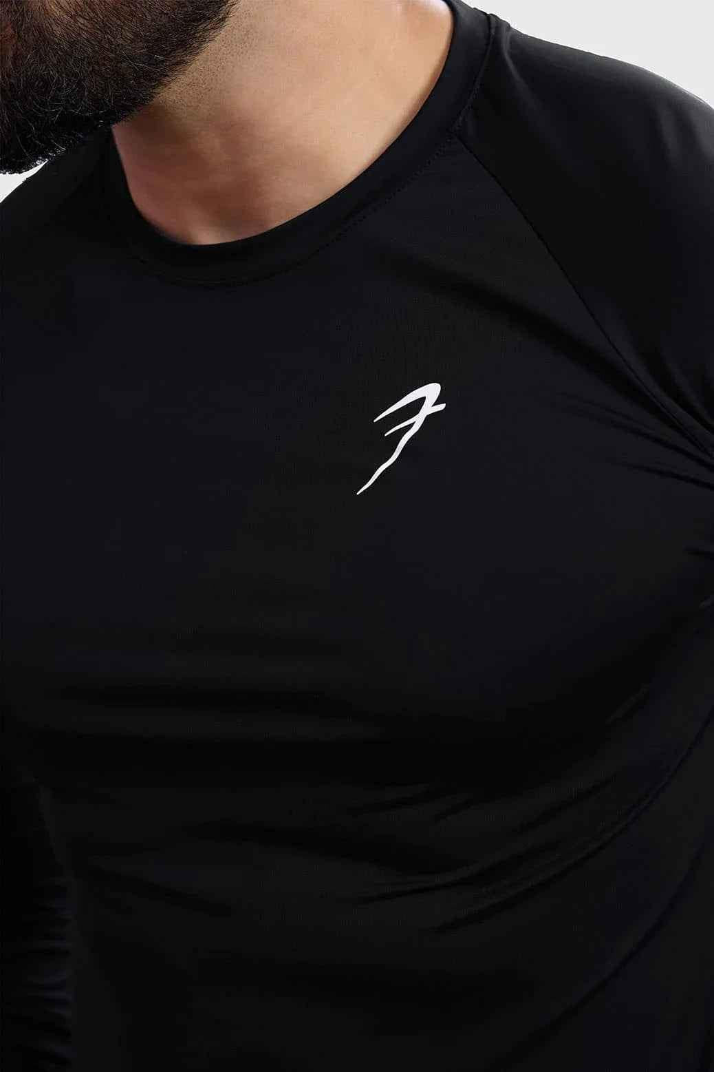 Black Bare Nylon Fullsleeves T-shirt by Fuaark Nz, showcasing a sleek, fitted design with long sleeves and smooth fabric.