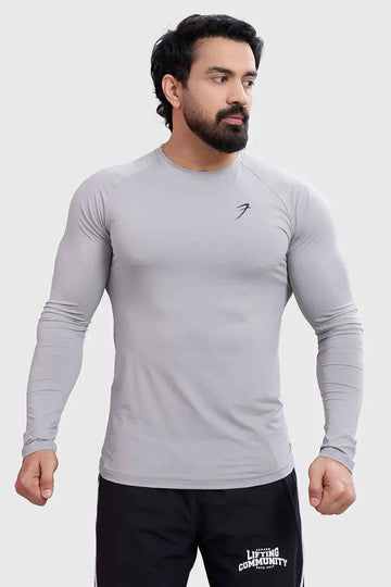 Light grey Bare Nylon full-sleeve T-shirt by Fuaark Nz, showing the fitted design and soft fabric texture.