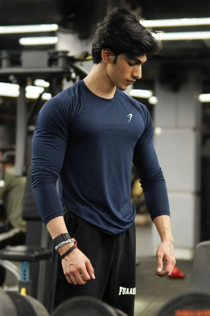 Navy Bare Nylon Fullsleeves T-shirt by Fuaark Nz, showing long-sleeve design and lightweight fabric on a model.