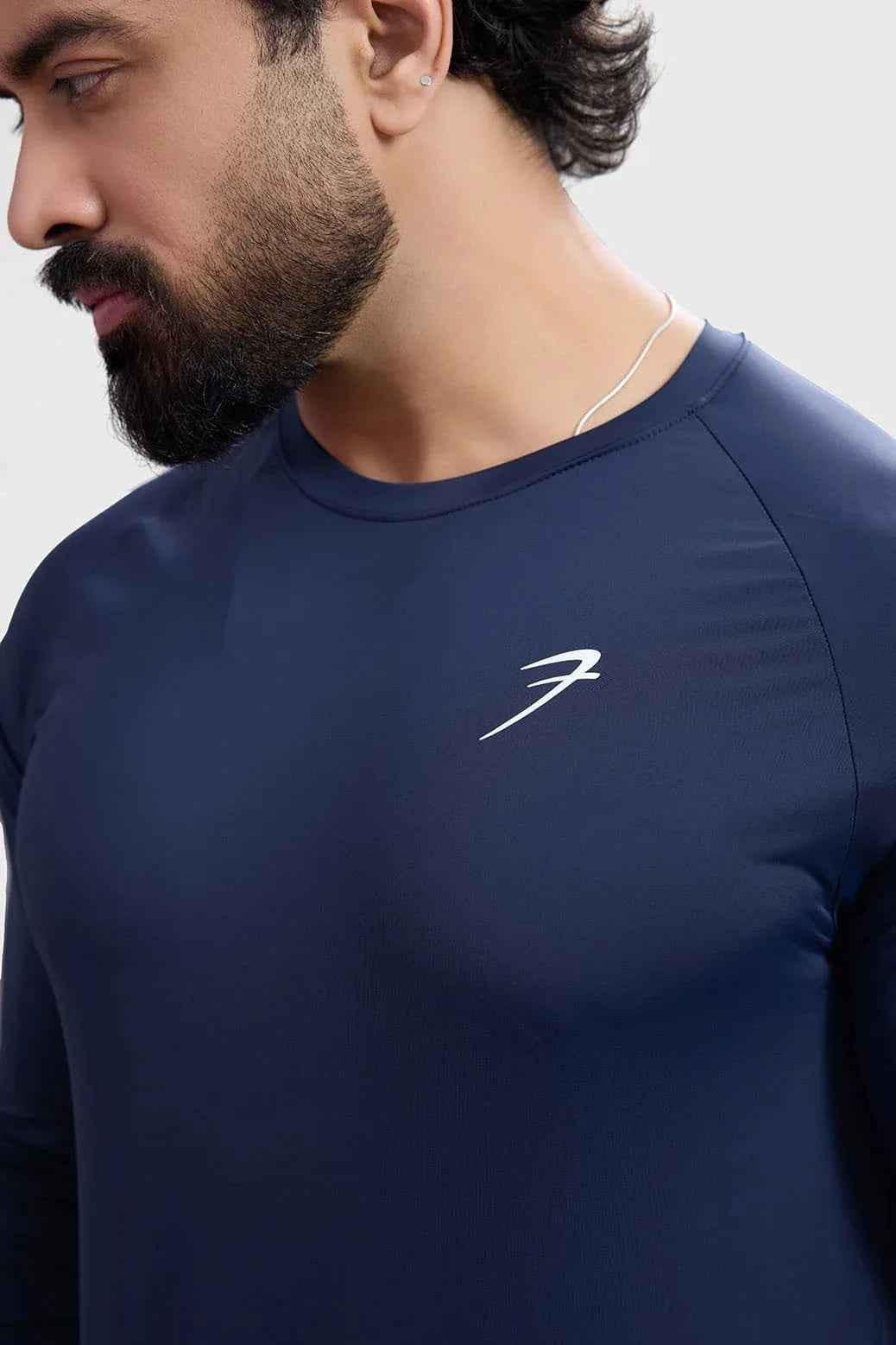 Navy Bare Nylon full-sleeve T-shirt by Fuaark Nz, featuring a sleek, fitted design and smooth fabric visible in the image.