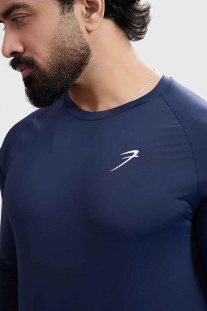 Navy Bare Nylon full-sleeve T-shirt by Fuaark Nz, featuring a sleek, fitted design and smooth fabric visible in the image.