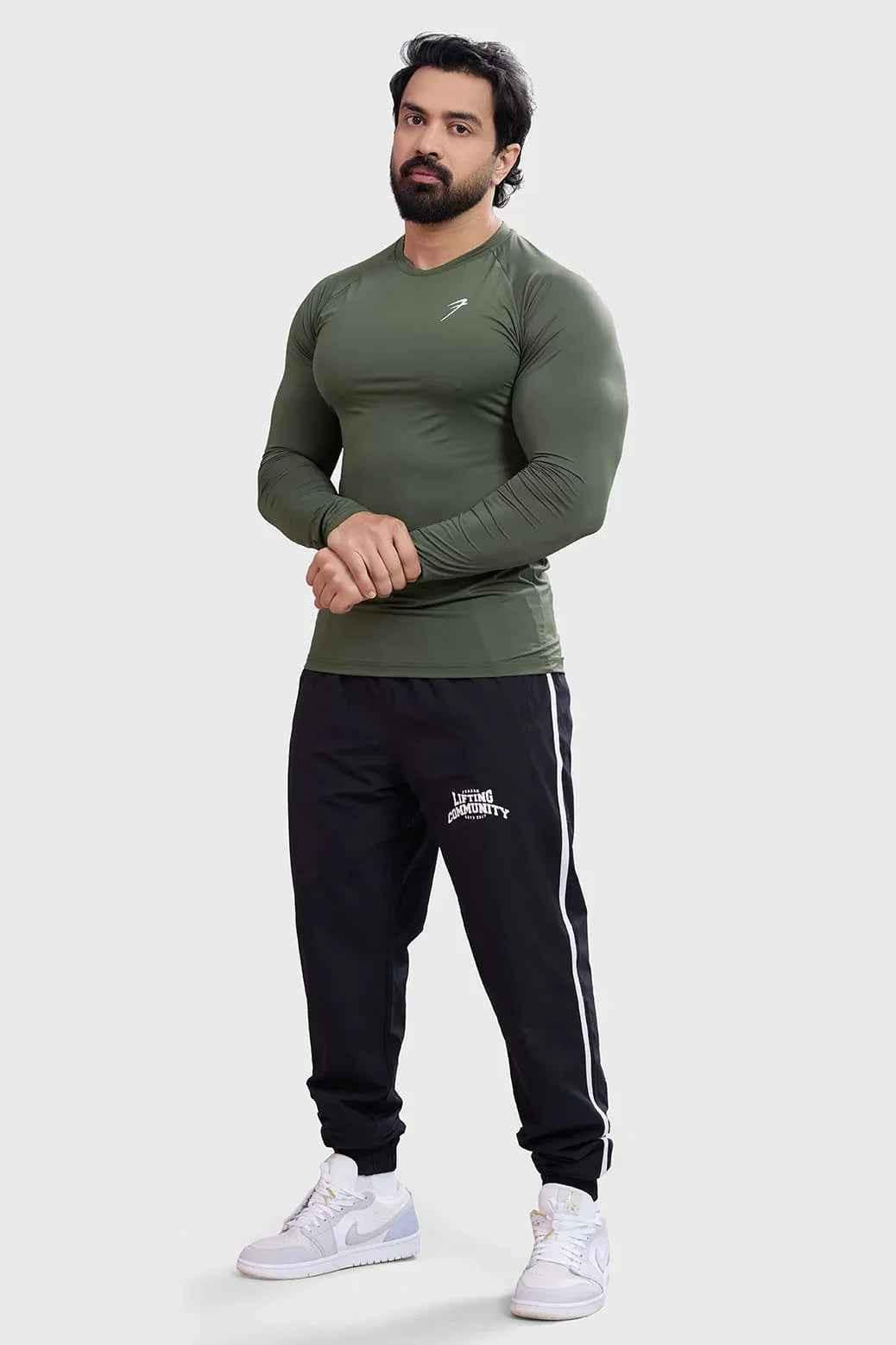 Olive Bare Nylon Fullsleeves T-shirt by Fuaark Nz, showcasing a sleek, long-sleeve design with a fitted silhouette.
