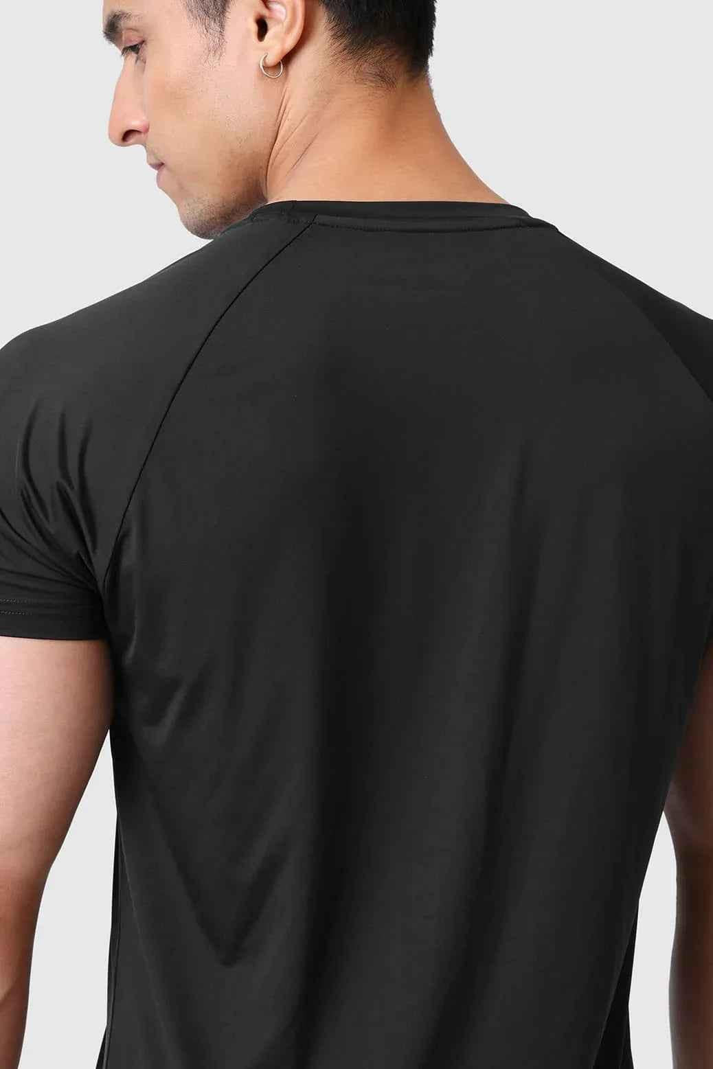 Black Bare Nylon T-shirt by Fuaark Nz, showcasing a sleek, fitted design made from durable nylon fabric.