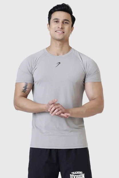 Light grey Bare Nylon T-shirt by Fuaark Nz, casual fit with soft fabric, shown on a hanger.