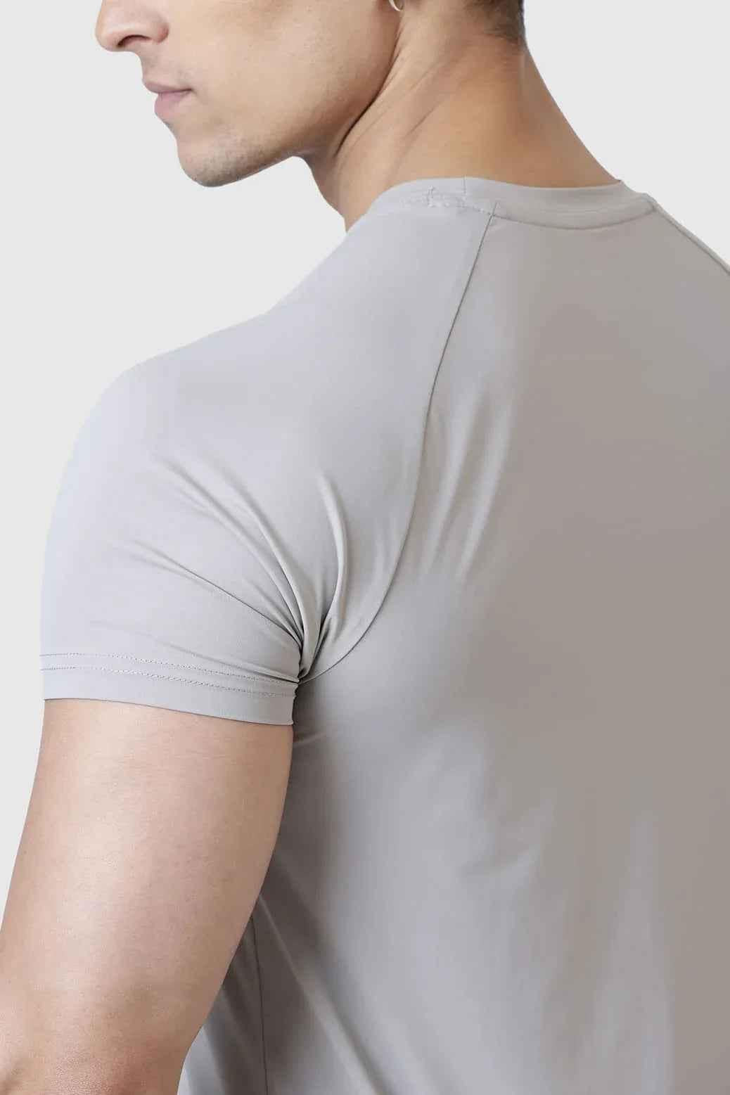 Light grey Fuaark Nz Bare Nylon T-shirt displayed flat, showcasing its soft fabric and classic fit.