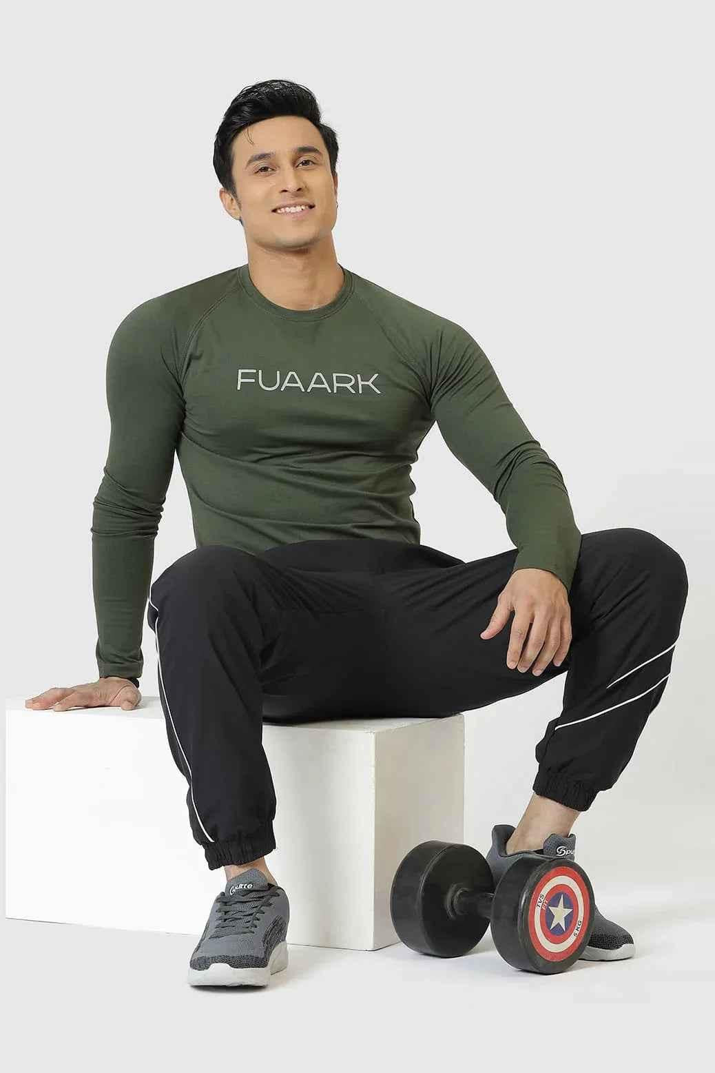 Olive green Chase full-sleeves T-shirt by Fuaark NZ, shown on a plain background, highlighting the casual style and fabric texture.