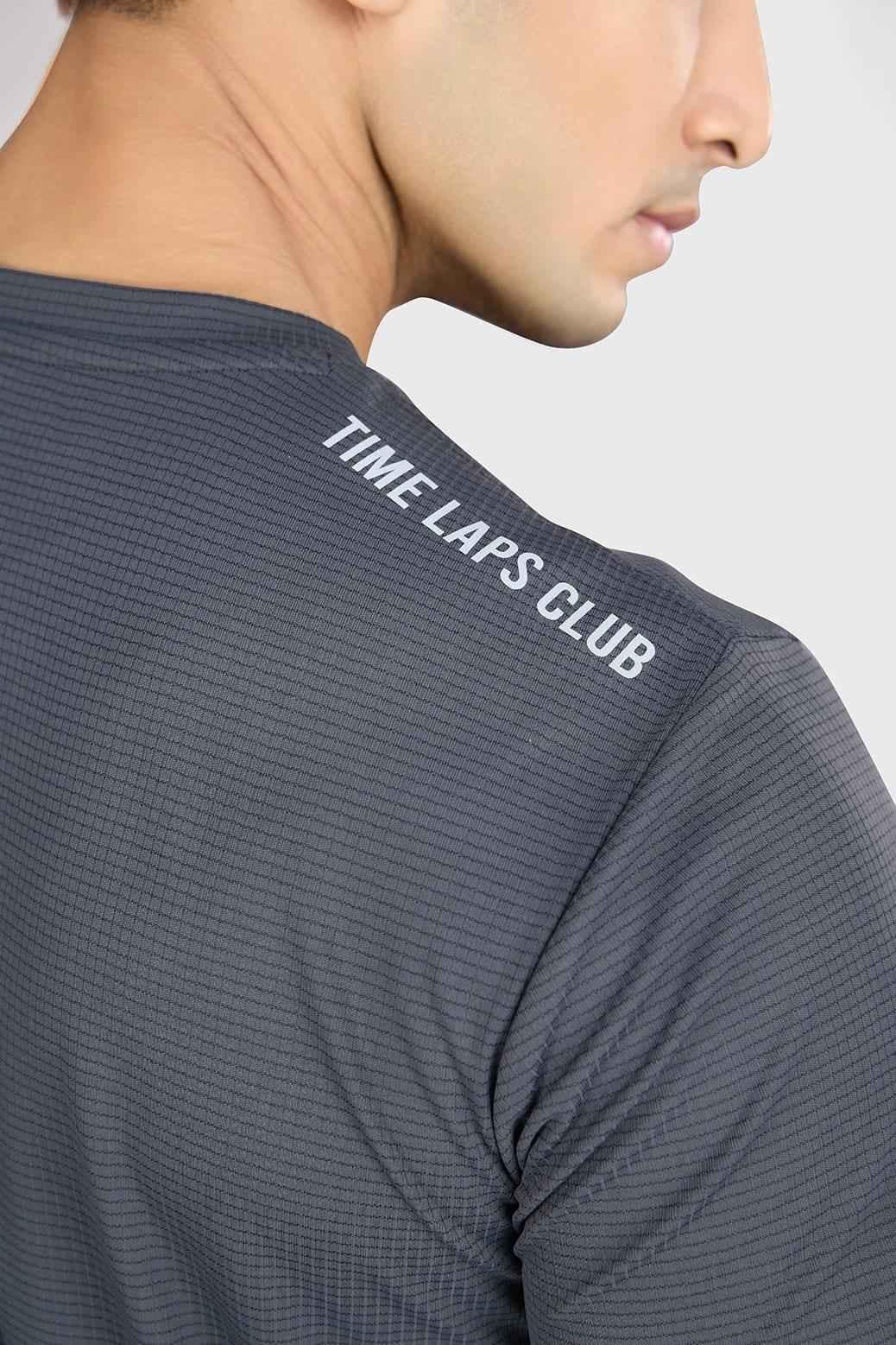 Grey Fuaark NZ running T-shirt with checks, lightweight and breathable performance tee for active wear.