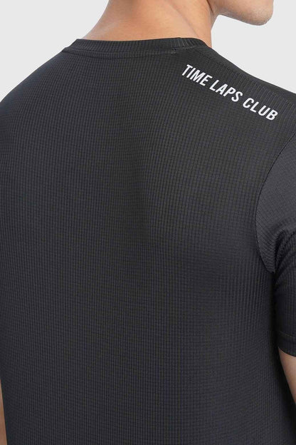 Black Fuaark Nz Checks Running T-shirt featuring a stylish checkered design, casual fit, and breathable fabric.