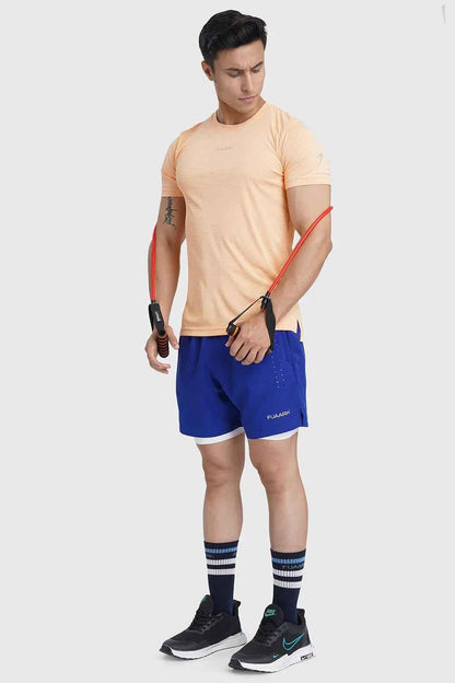 Fuaark NZ Checks Running T-shirt in peach with a checkered pattern, designed for comfort and activewear.