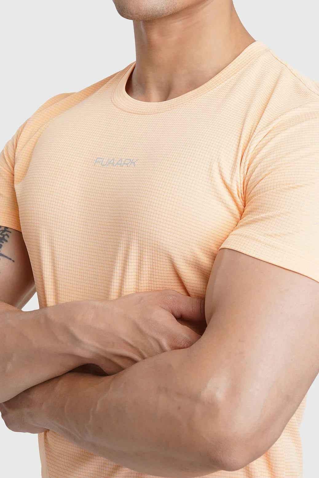 Peach Checks Running T-shirt by Fuaark Nz featuring a casual, sporty design with checkered pattern and short sleeves.