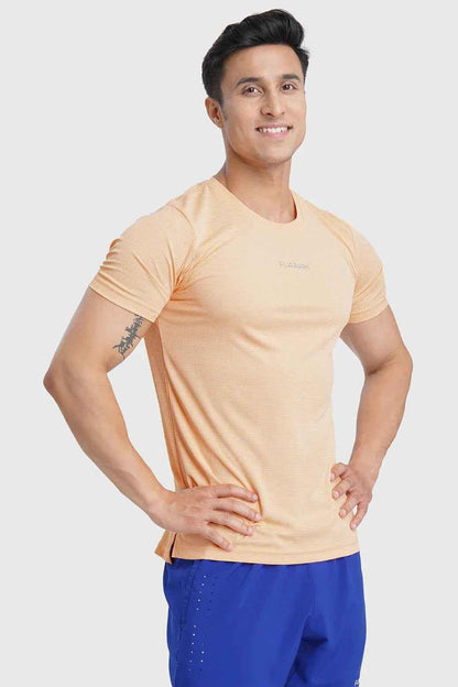Fuaark Nz checks running T-shirt in peach color, lightweight fabric, casual fit, ideal for sports and active wear.