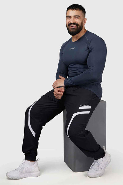 Grey Compression 2.0 Full Sleeves T-shirt by Fuaark Nz, made of breathable fabric with a snug fit for athletic wear.