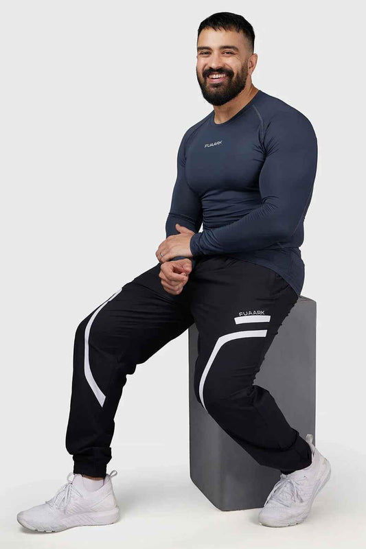 Grey Compression 2.0 Full Sleeves T-shirt by Fuaark Nz, made of breathable fabric with a snug fit for athletic wear.
