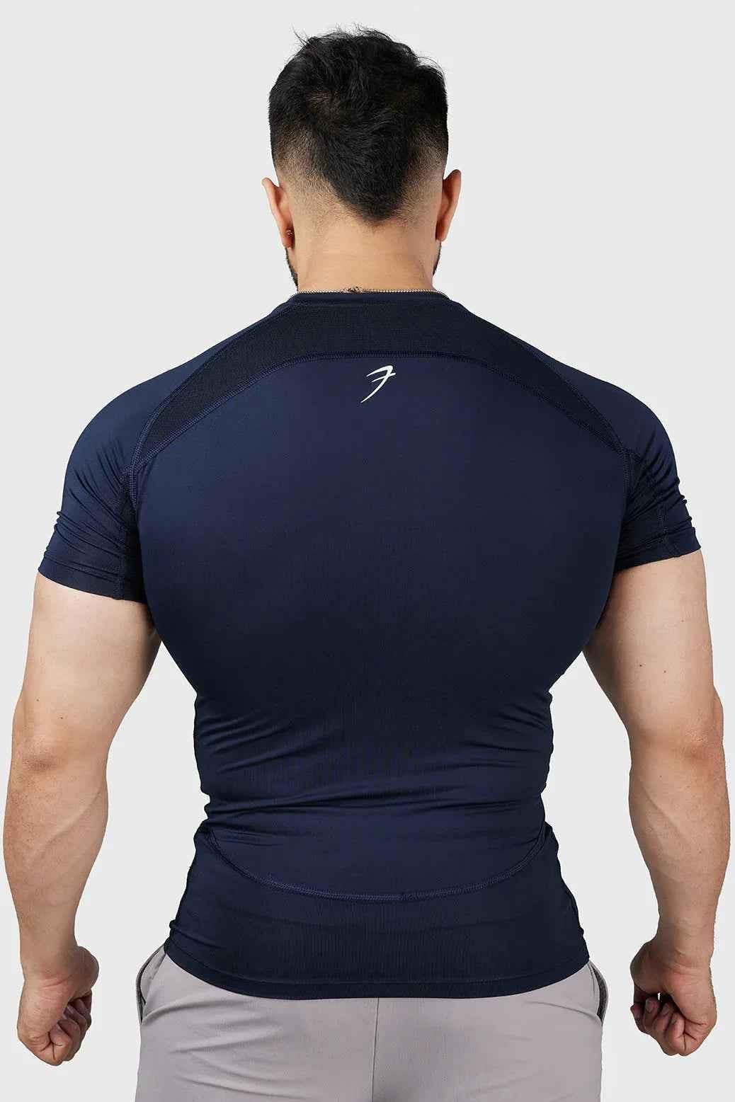 Navy Compression 2.0 T-shirt by Fuaark Nz, designed for athletic fit with moisture-wicking fabric and sleek style.