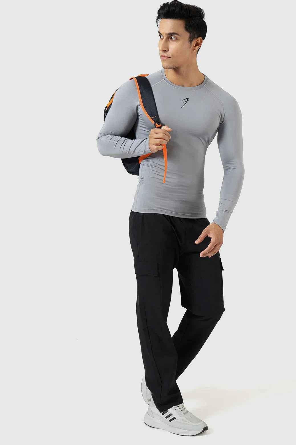 Fuaark Nz compression full sleeves T-shirt in Sea Grey, designed for support and comfort, shown on a plain background.