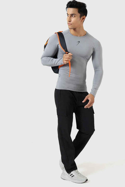 Fuaark Nz compression full sleeves T-shirt in Sea Grey, designed for support and comfort, shown on a plain background.