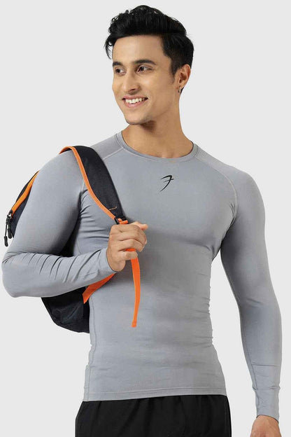 Fuaark Nz compression full sleeves T-shirt in Sea Grey, designed for support and comfort, shown on a model.