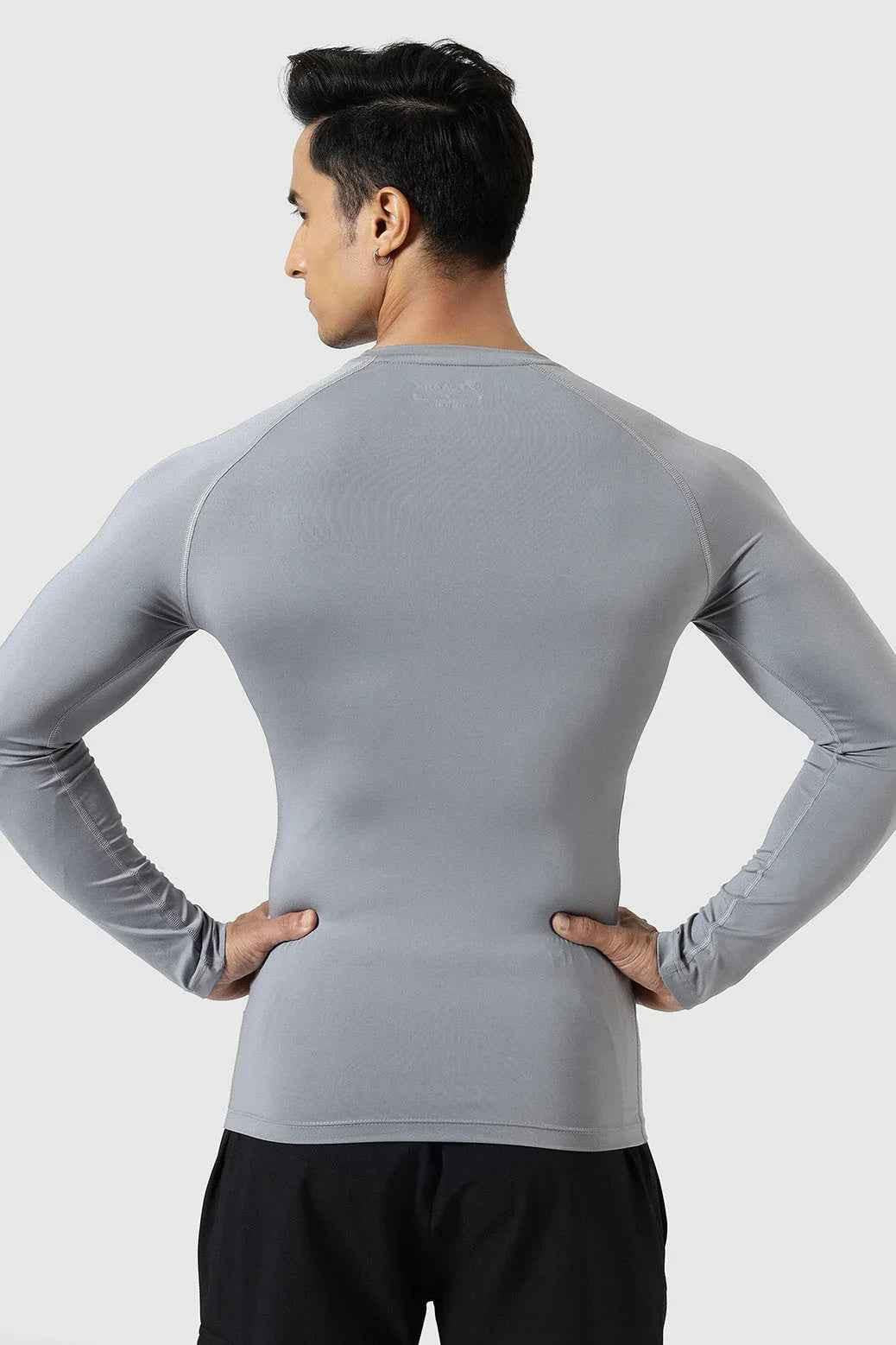 Fuaark Nz compression full sleeves T-shirt in Sea Grey, designed for support and comfort with a fitted athletic look.