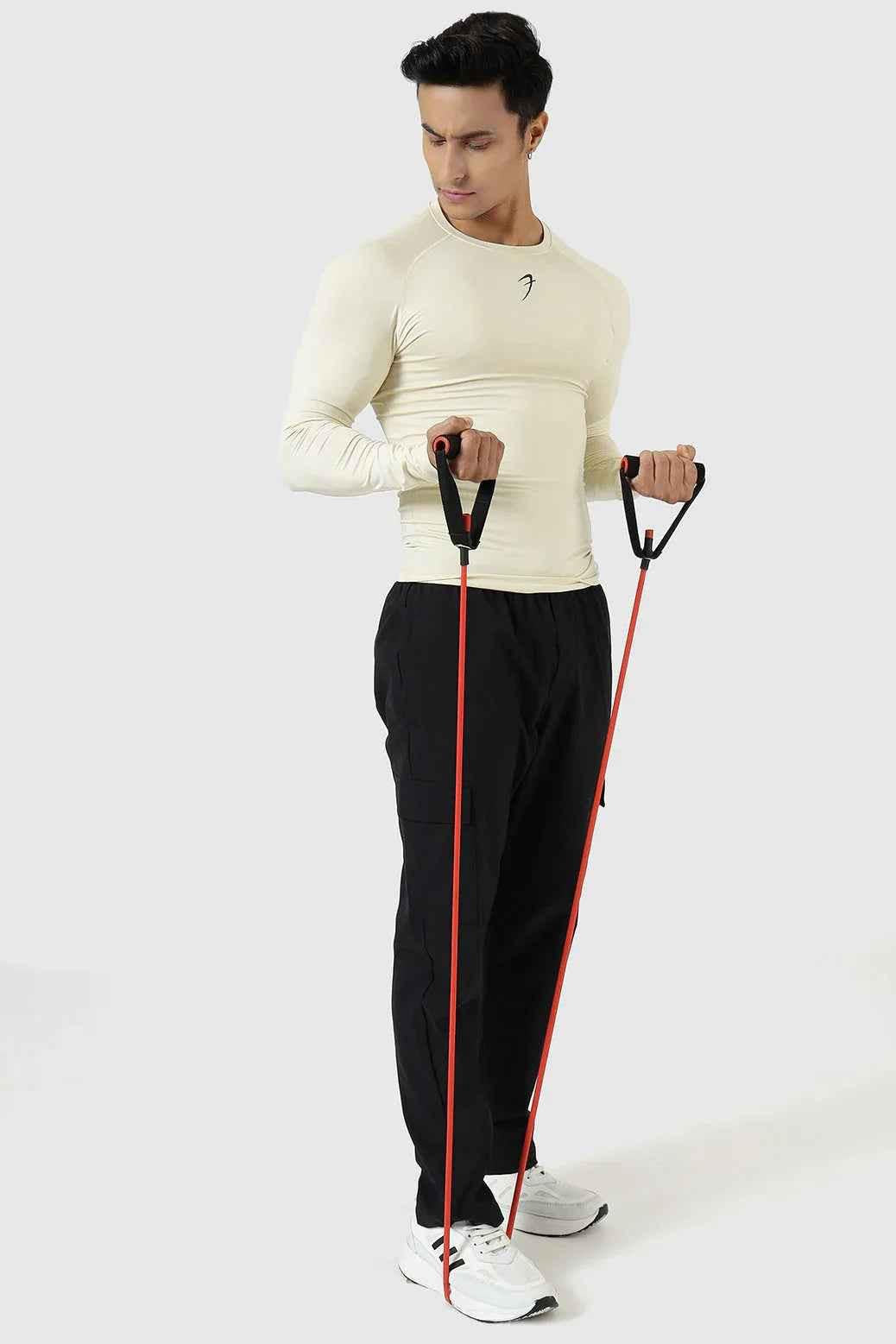 Beige Fuaark Nz compression full-sleeves T-shirt, made of stretchy fabric, designed for comfort and support.