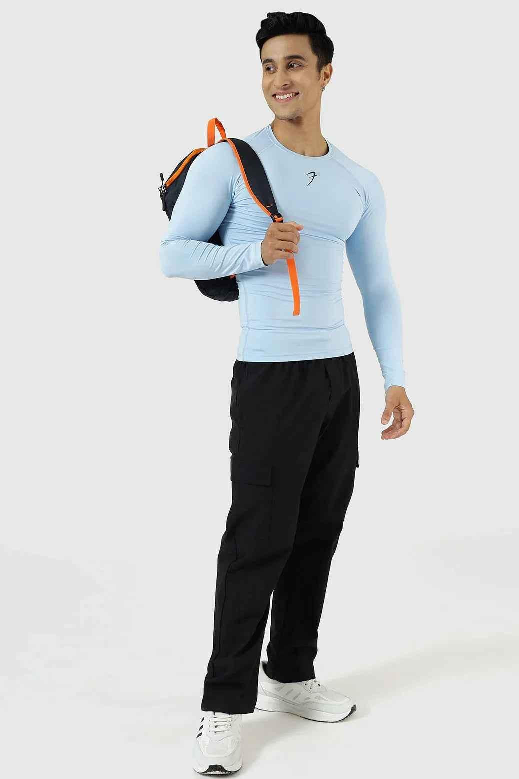 Fuaark Nz compression fullsleeves T-shirt in Glacial Blue, close-up of fabric and fitted design for athletic performance.