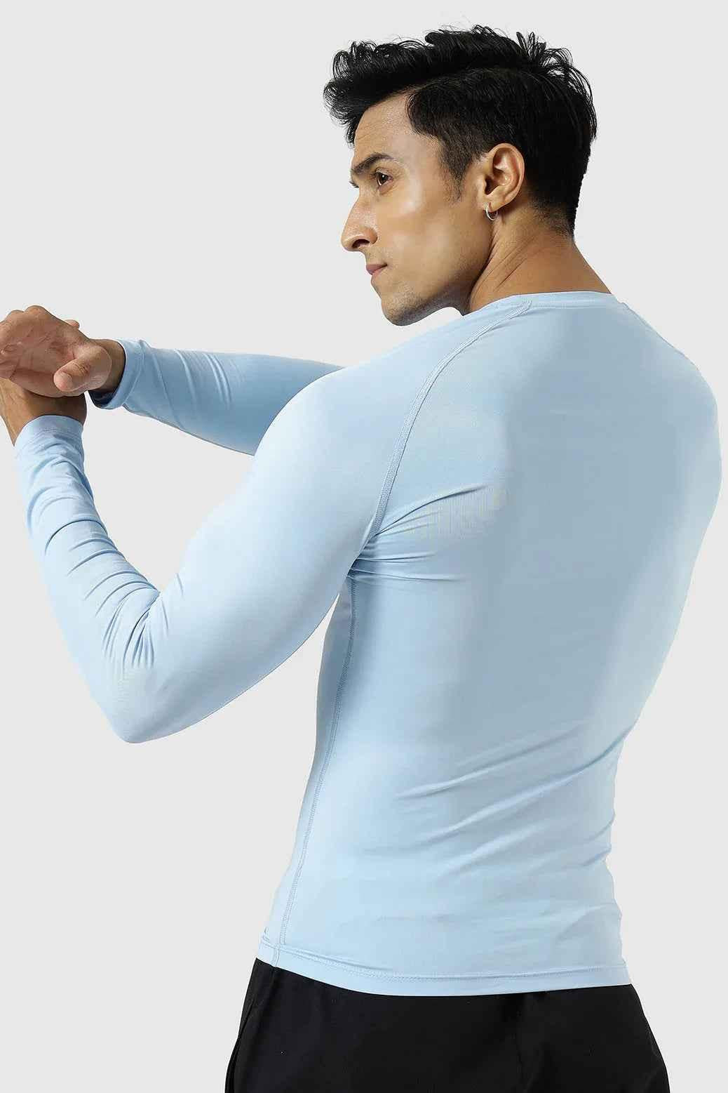 Fuaark Nz compression fullsleeves T-shirt in Glacial Blue, made from breathable fabric for active wear and athletic support.