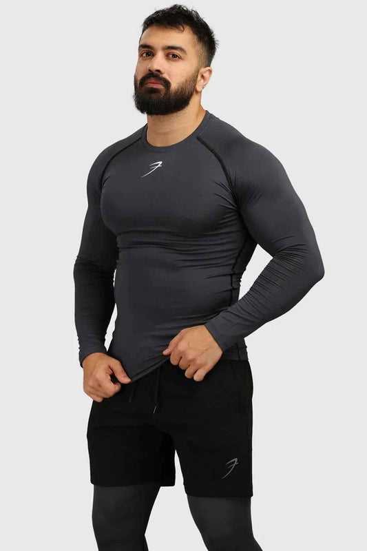 Grey Fuaark Nz compression full-sleeves T-shirt with a snug fit, ideal for athletic wear and active lifestyles.