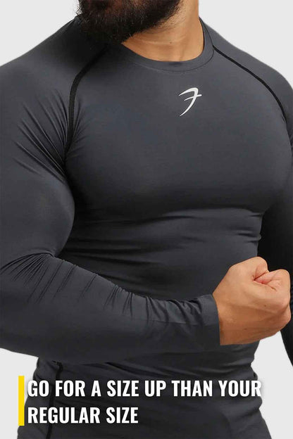 Grey compression fullsleeves T-shirt by Fuaark Nz, shown with snug fit and smooth fabric for athletic or casual wear.