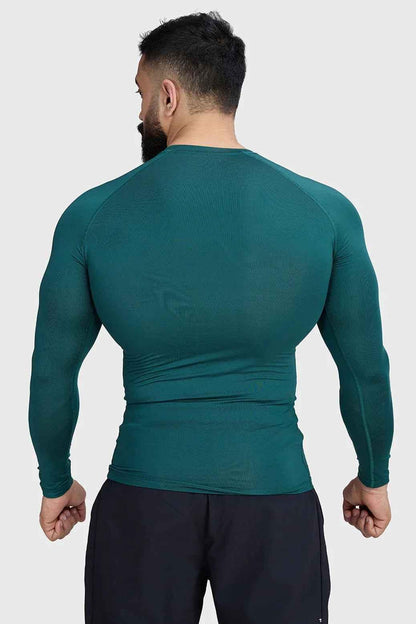 Fuaark Nz compression full-sleeve T-shirt in emerald green, designed for comfort and performance, shown on a mannequin.