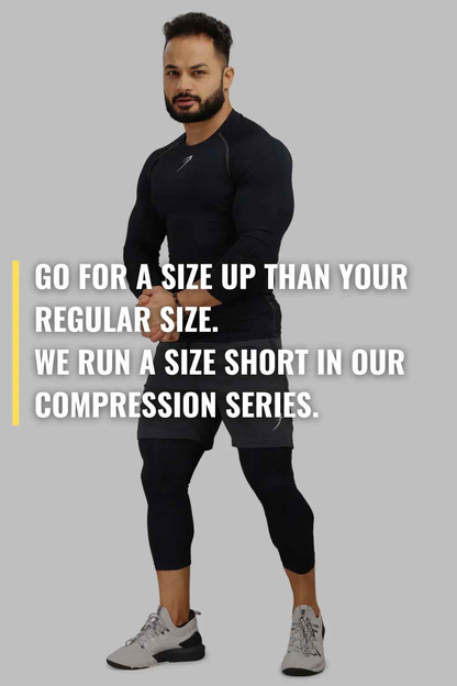 Navy compression full-sleeves T-shirt by Fuaark NZ, shown on a plain background, highlighting its fitted design and smooth fabric.