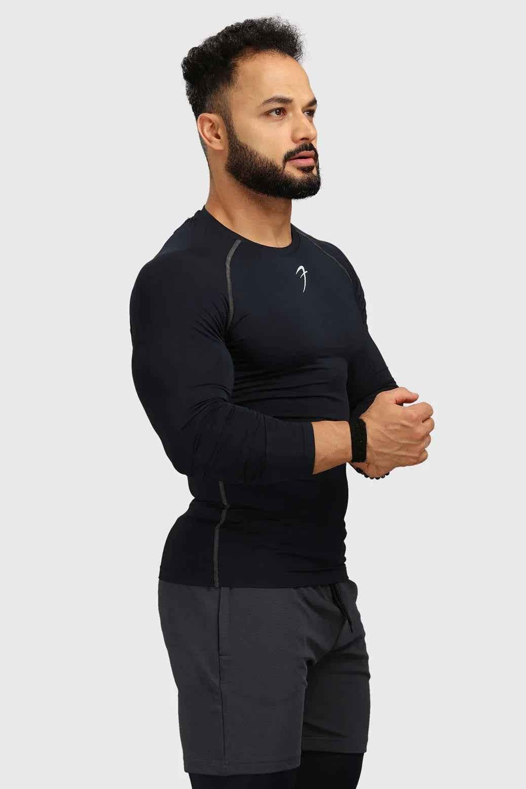 Fuaark Nz navy compression full-sleeves T-shirt featuring a snug fit and lightweight fabric, designed for athletic wear.