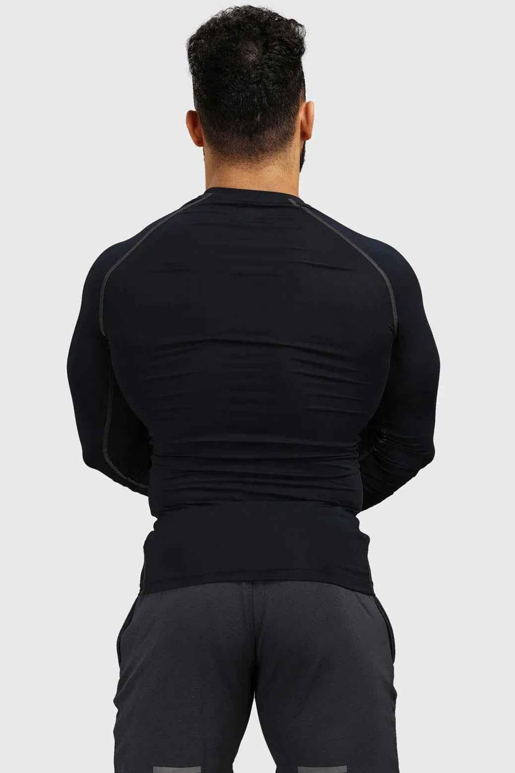 Navy compression fullsleeves T-shirt by Fuaark NZ with snug fit and sleek design, displayed on a plain background.