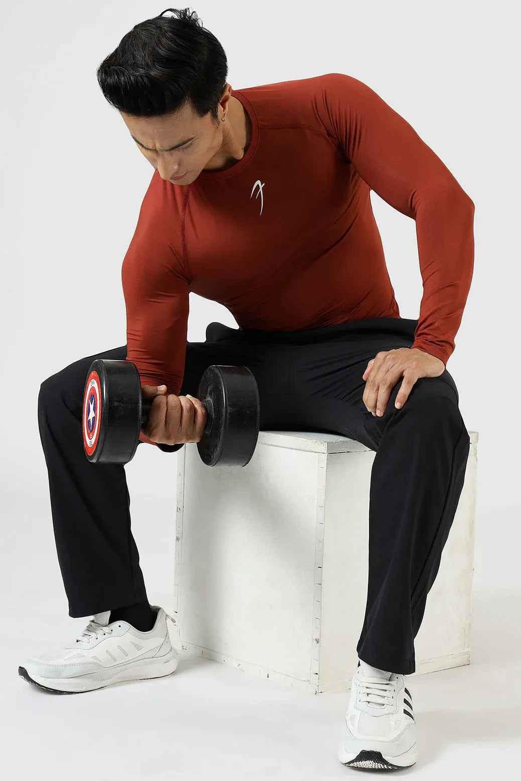 Fuaark Nz compression full-sleeves salsa T-shirt showcasing a fitted, stretchy athletic shirt with vibrant salsa color.