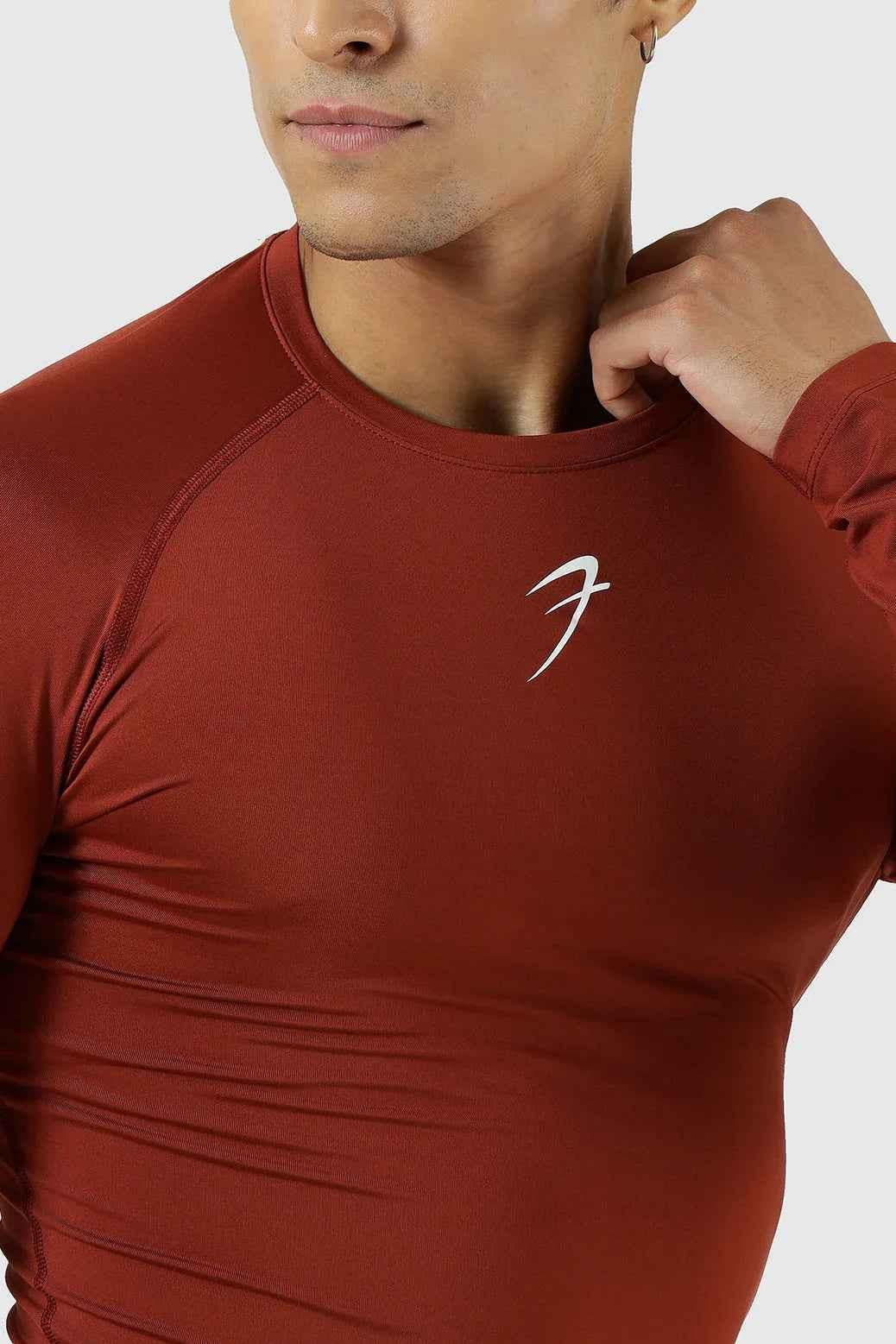 Fuaark Nz compression full-sleeves T-shirt in salsa color, made for active wear and sports performance.