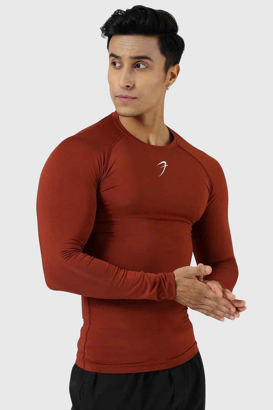 Fuaark Nz compression full-sleeves T-shirt in salsa color, designed for active wear and athletic performance.