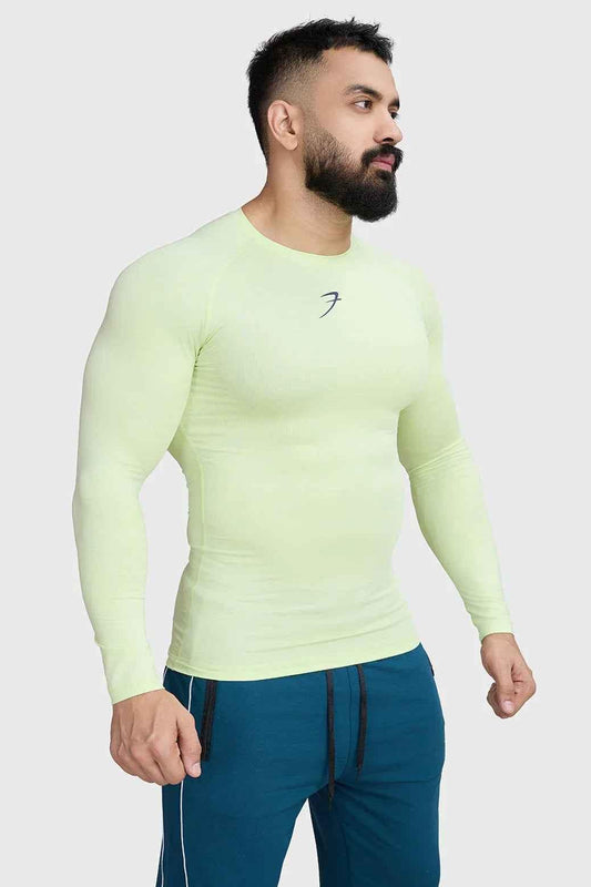 Fuaark Nz compression long sleeve lime T-shirt for enhanced performance, showcasing a fitted athletic shirt with moisture-wicking fabric.