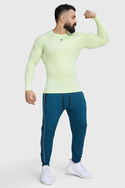 Fuaark Nz lime compression long sleeve T-shirt for enhanced athletic performance, shown on a model with a fitted design.