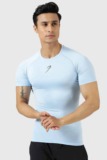 Men's compression T-shirt in Glacial Blue by Fuaark Nz, close-up of fitted, breathable athletic shirt for activewear.