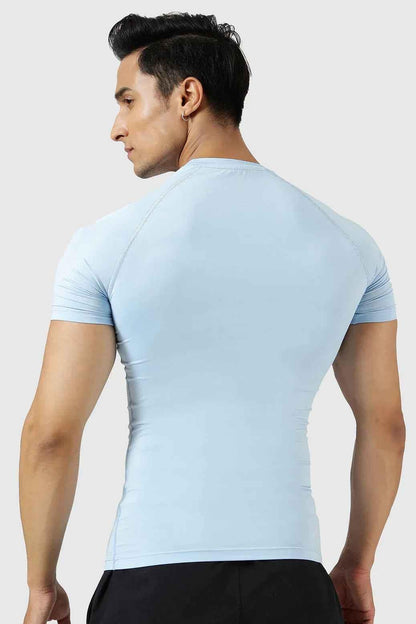 Men's compression T-shirt in Glacial Blue by Fuaark Nz, featuring a fitted design and breathable fabric for active wear.