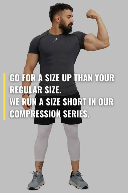 Grey compression T-shirt from Fuaark Nz featuring a snug fit and breathable fabric, ideal for workout and active wear.