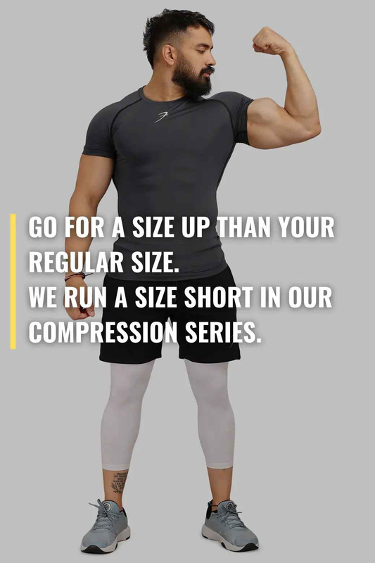 Grey compression T-shirt from Fuaark Nz featuring a snug fit and breathable fabric, ideal for workout and active wear.