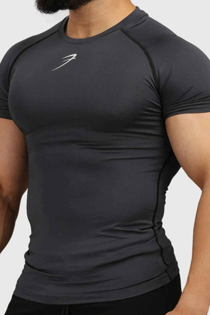Fuaark Nz grey compression T-shirt for men, made from breathable fabric, designed for athletic performance and comfort.