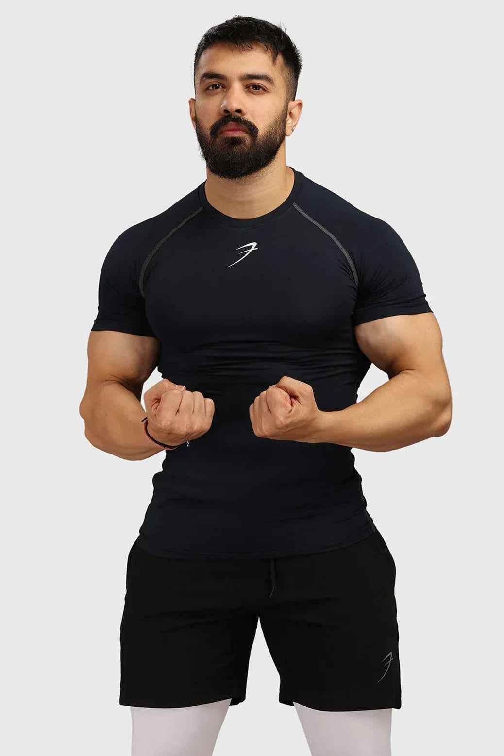 Navy compression T-shirt from Fuaark NZ, fitted men's T-shirt with stretchy fabric for athletic support and comfort.